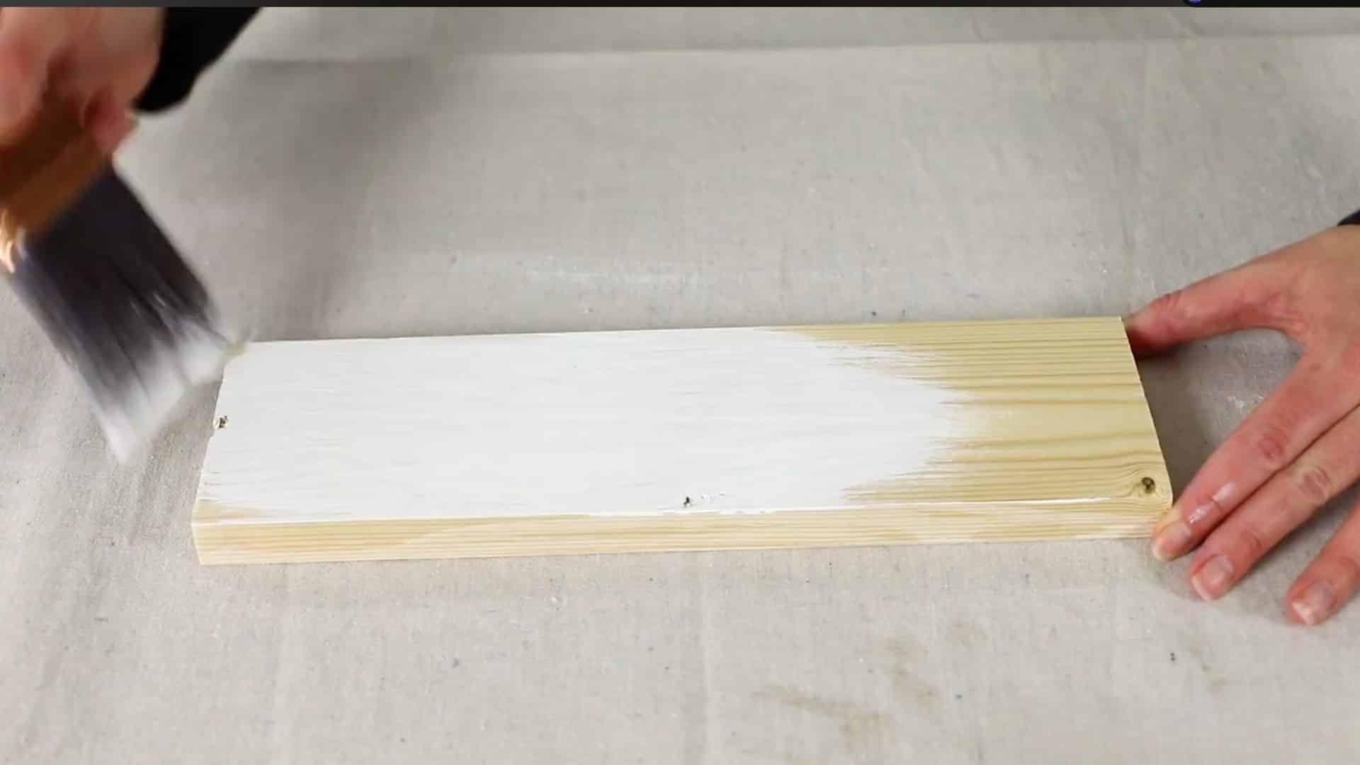 brush whitewash onto wood