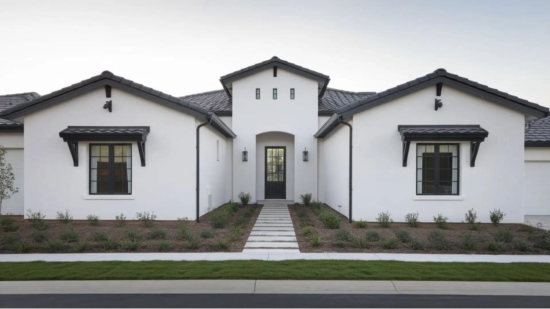 white stucco exterior With defined black trim