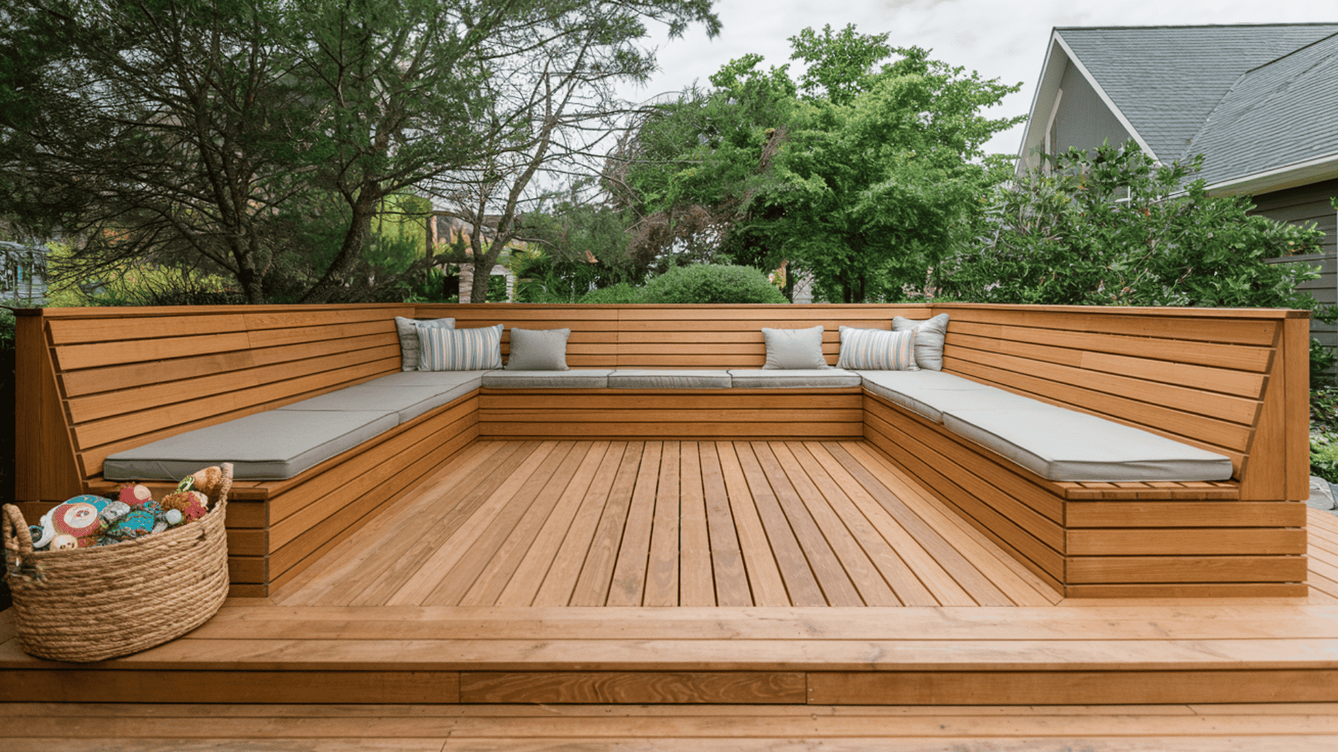 built-in corner bench seating with storage on a wooden deck maximizes outdoor space efficiently.