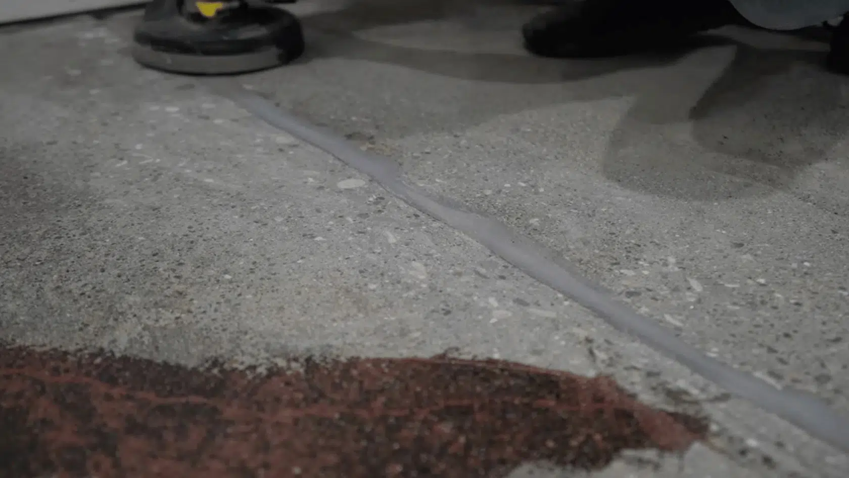 leveled concrete crack repair after curing, creating a smooth and even surface finish.