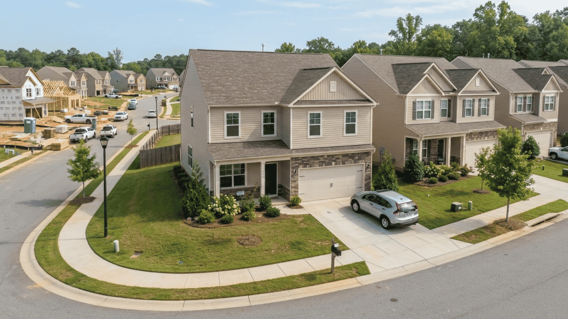 Production home in a suburban neighborhood showing standard design and affordable new construction style.