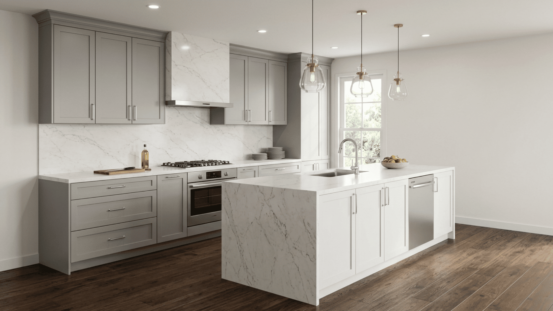 Gray and white cabinets with marble-look counters, waterfall island, and dark wood floors.
