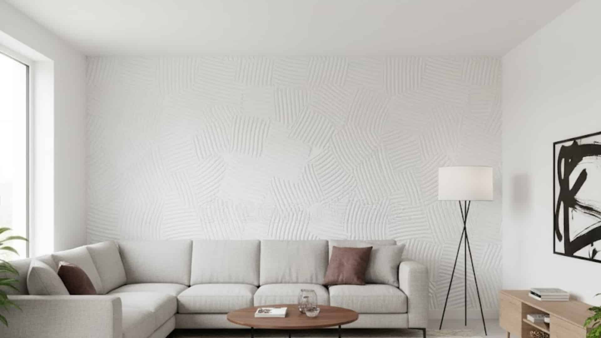 minimalist living room with cream sectional and white comb fish scale textured wall