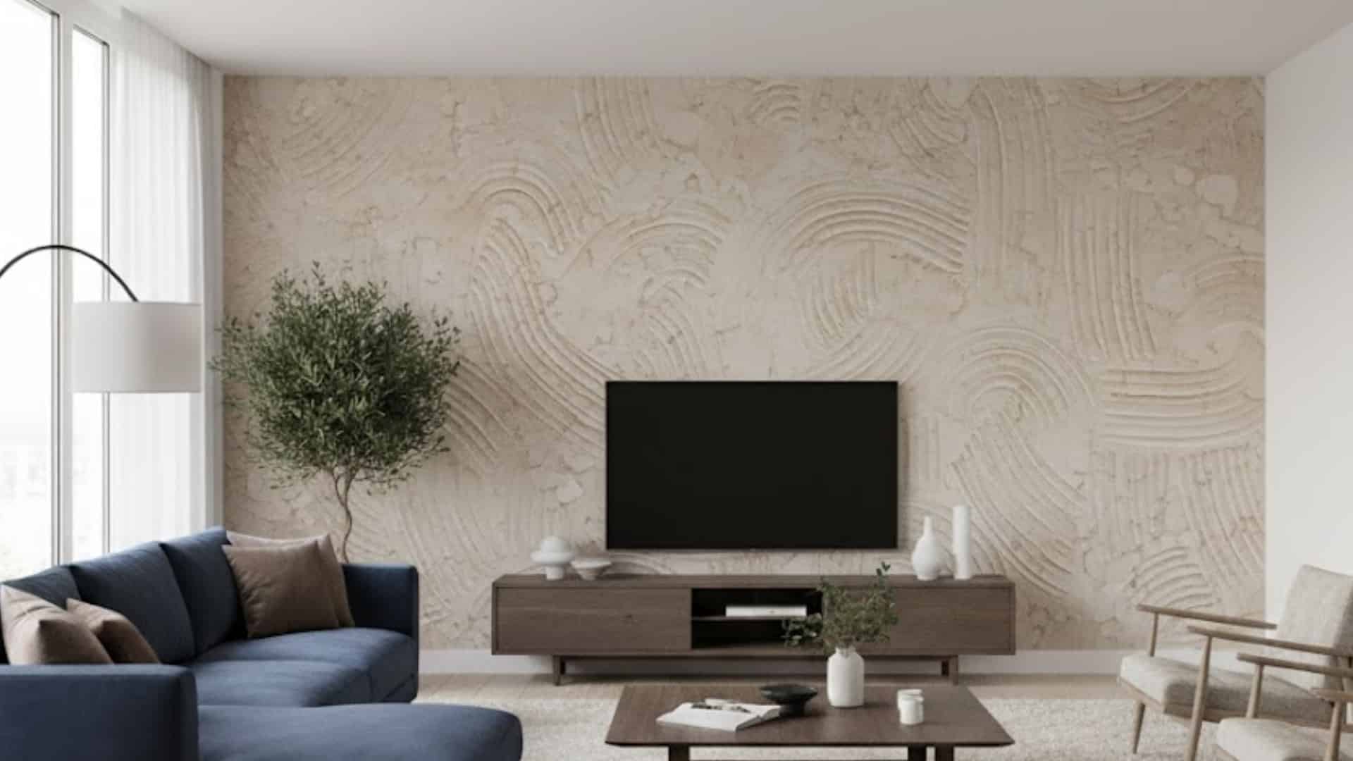 modern living room with navy sofa and cream knockdown swirl textured feature wall